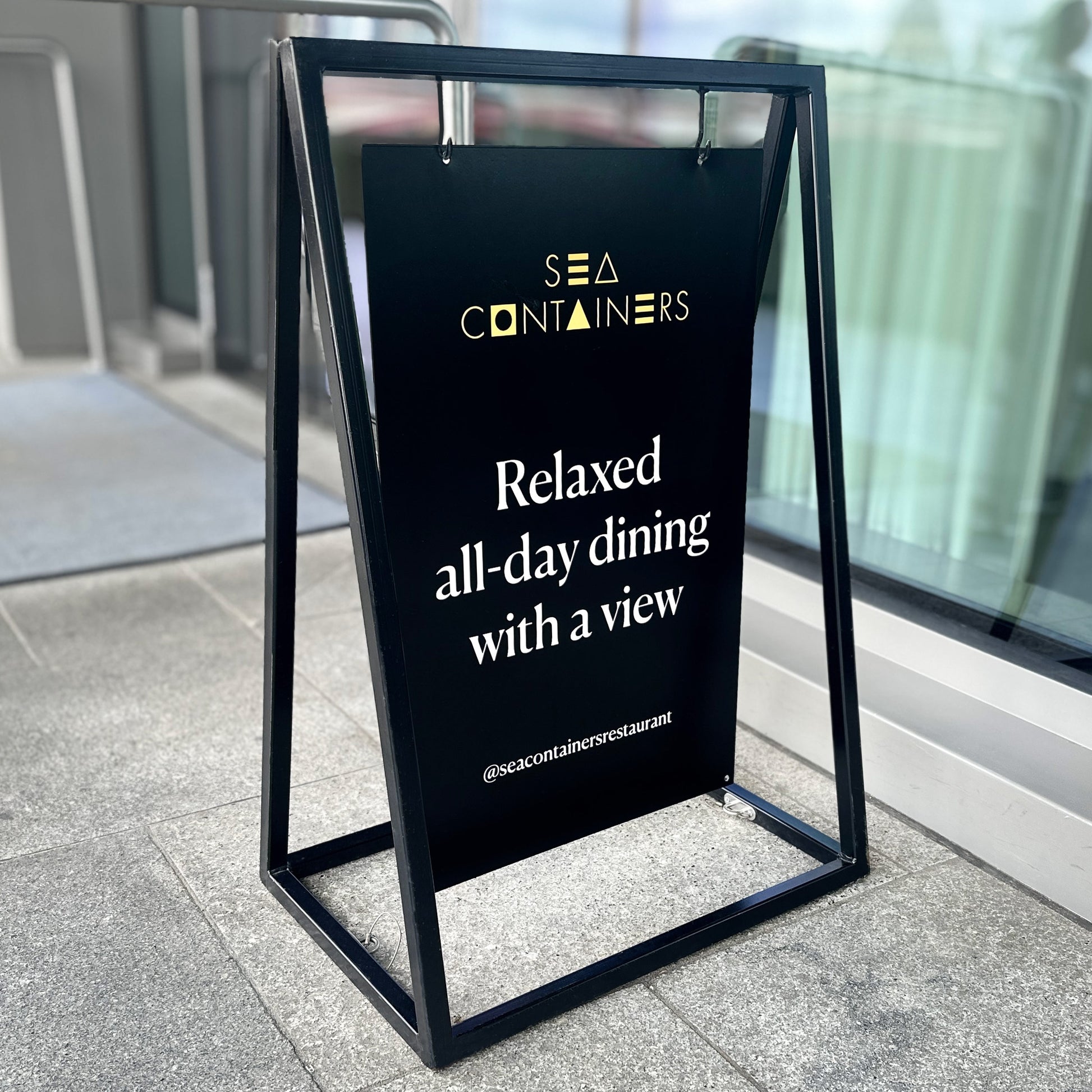 Black Swinging A Frame Sign