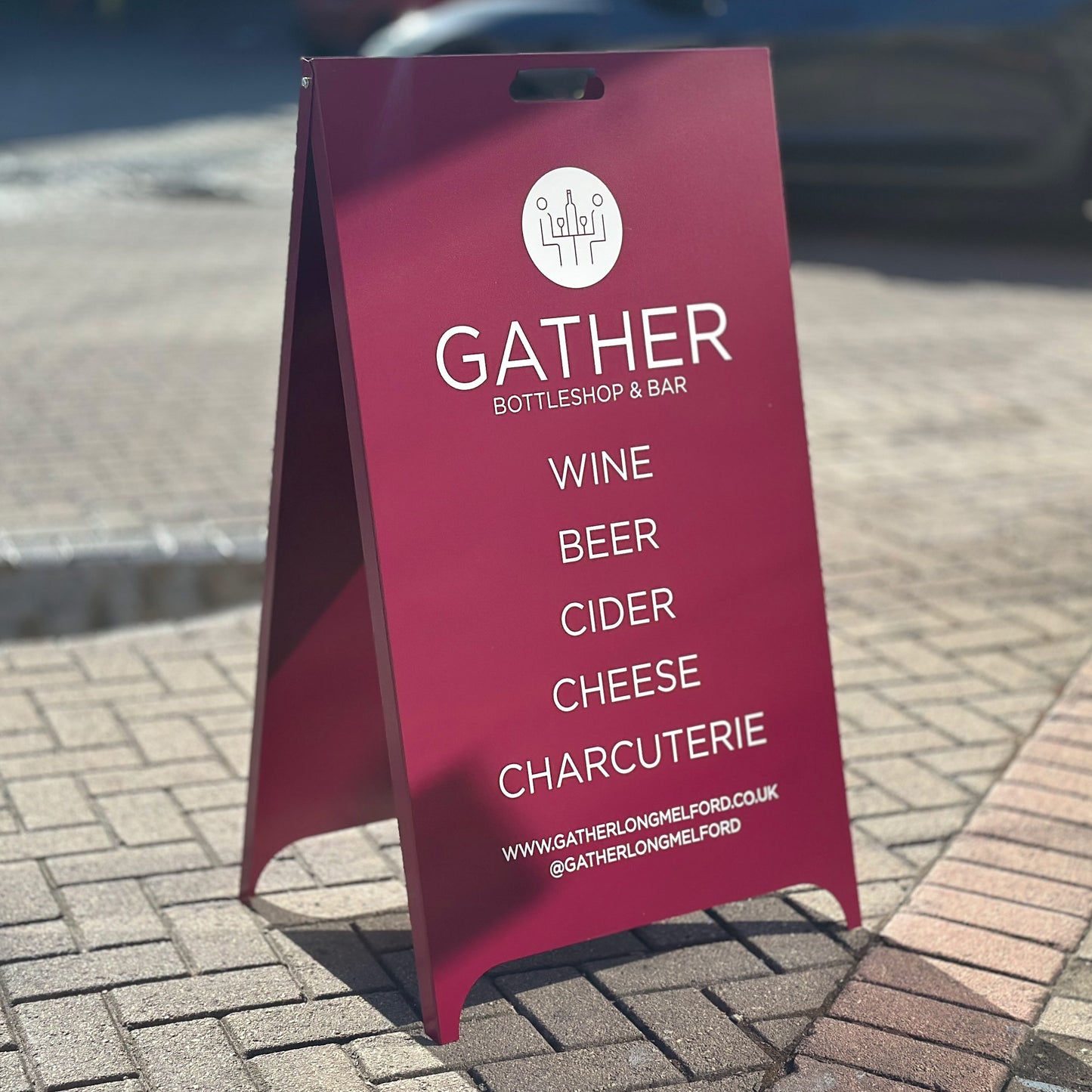 Burgundy Pavement Sign