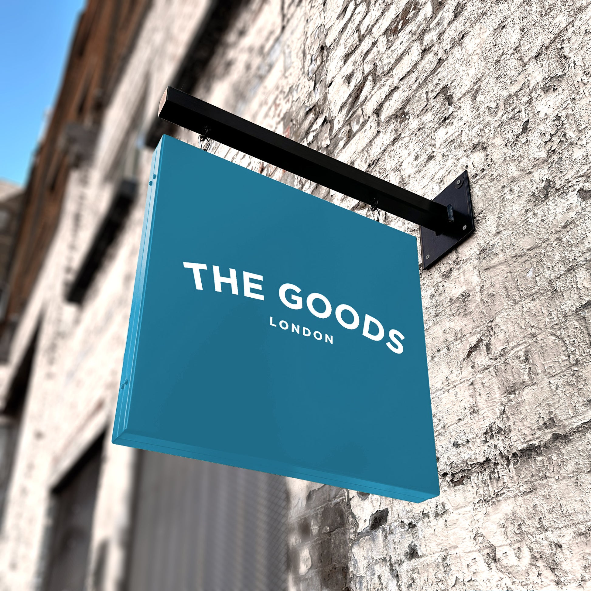 Blue Hanging Sign with wall bracket